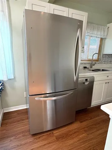 a bathroom with a sink a toilet and a bathtub