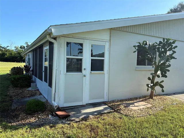 a house with trees in front of it