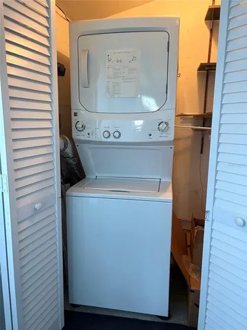 a front view of a building with outdoor space