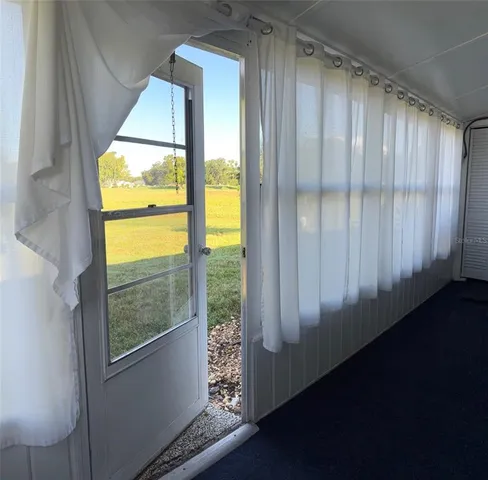 a kitchen with stainless steel appliances granite countertop a refrigerator microwave and stove