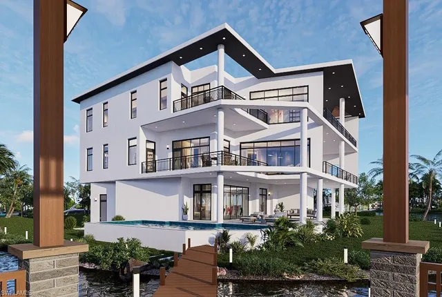 a front view of a residential apartment building with a yard