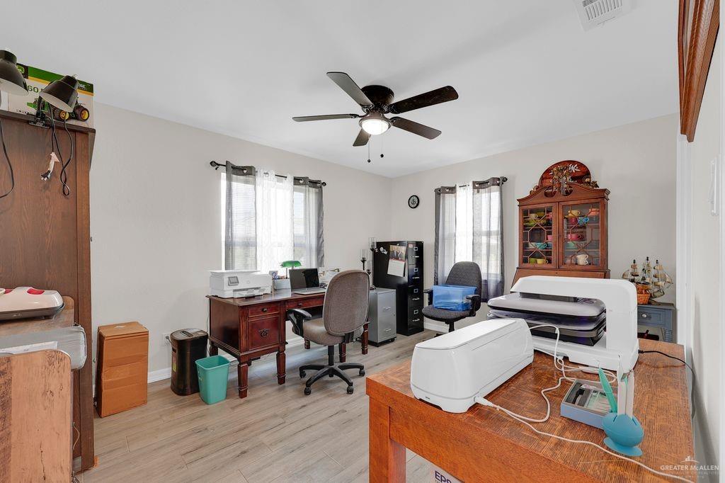 400 Taurus Street Mission, TX 78572 - Photo 13 of 16 Office area featuring ceiling fan and light wood-type flooring