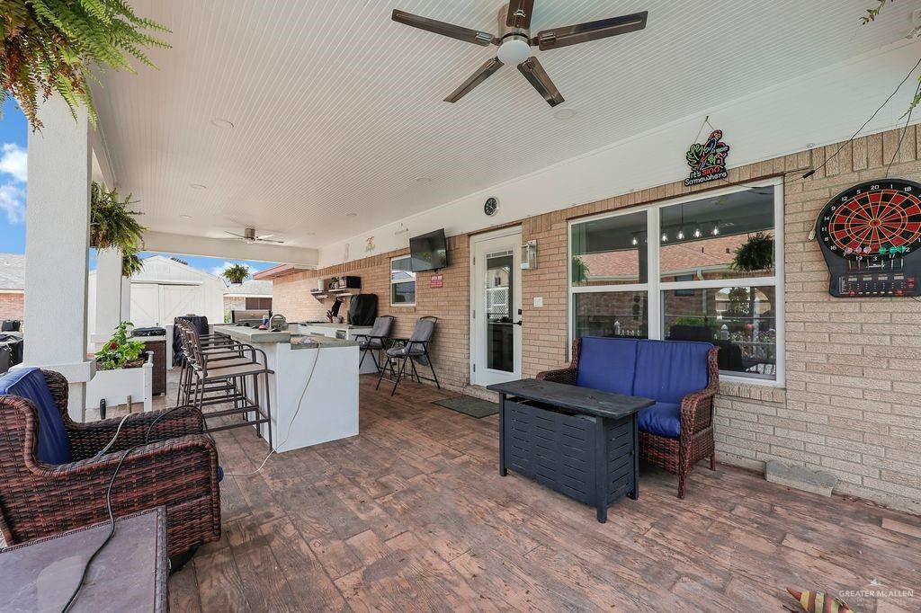 400 Taurus Street Mission, TX 78572 - Photo 16 of 16 View of patio with a ceiling fan