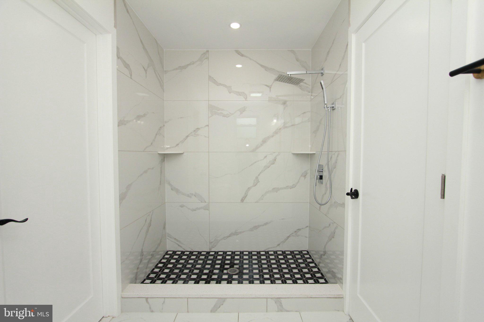 528 Crum Lynne Road Ridley Park, PA 19078 - Photo 26 of 51 Sleek modern shower with elegant tiles.