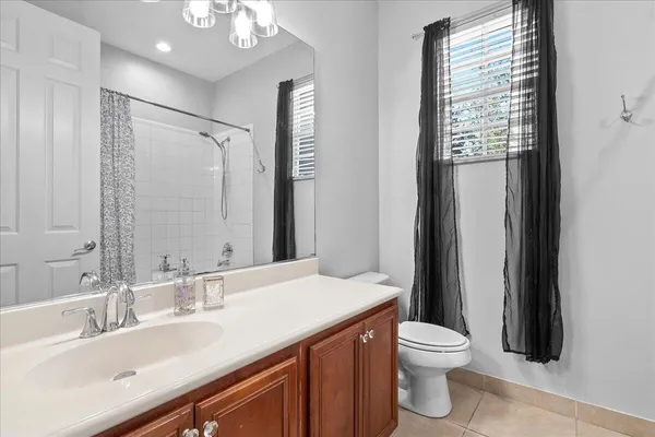 a bathroom with a tub and a shower