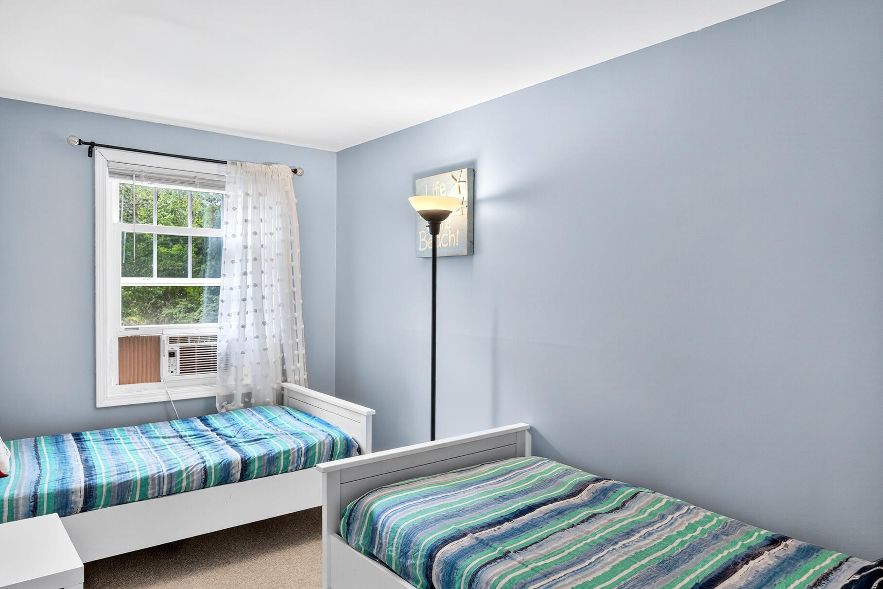 4 Coffey Lane Dennis Port, MA 02639 - Photo 21 of 48 a bedroom with a bed and window