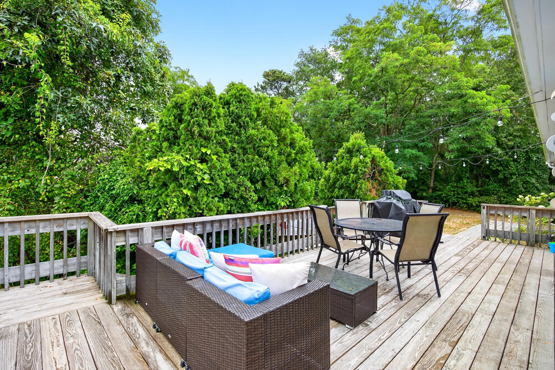 4 Coffey Lane Dennis Port, MA 02639 - Photo 33 of 48 a view of balcony with furniture and trees