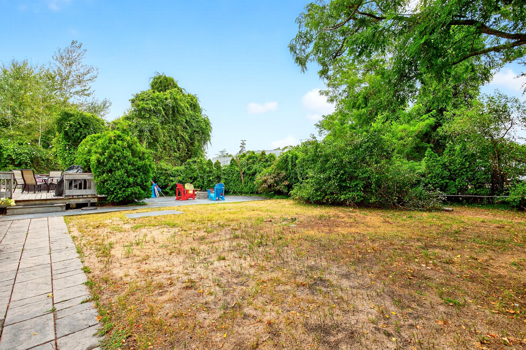 4 Coffey Lane Dennis Port, MA 02639 - Photo 43 of 48 a outdoor space with swimming pool and trees in the background