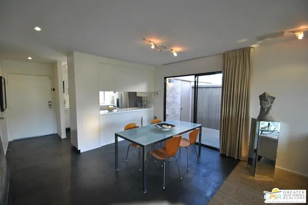 a room with furniture and wooden floor