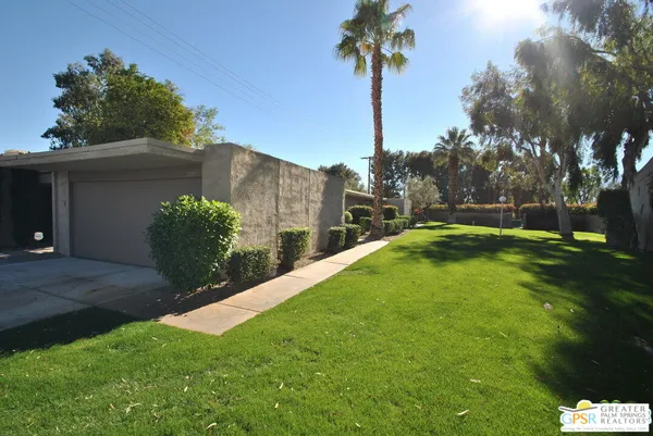 a view of a backyard with a garden
