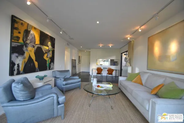 a living room with furniture and a couch