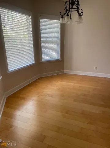 a view of a room with windows