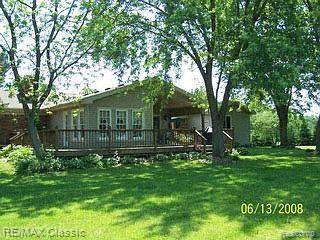 3322 Beattie Road Howell, MI 48843 - Photo 11 of 15 REAR OF HOME