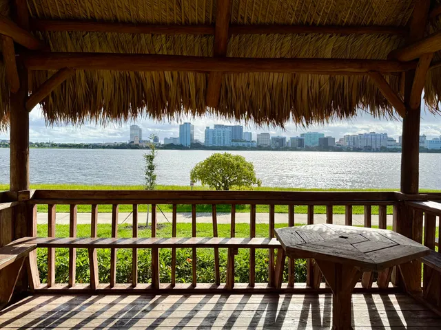 a view of a chairs and table in patio