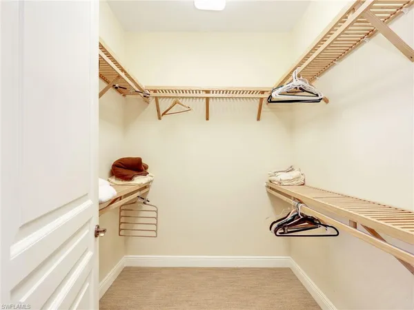 a view of a room with racks on the wall