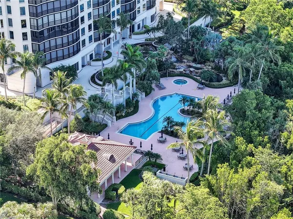 an aerial view of house with yard