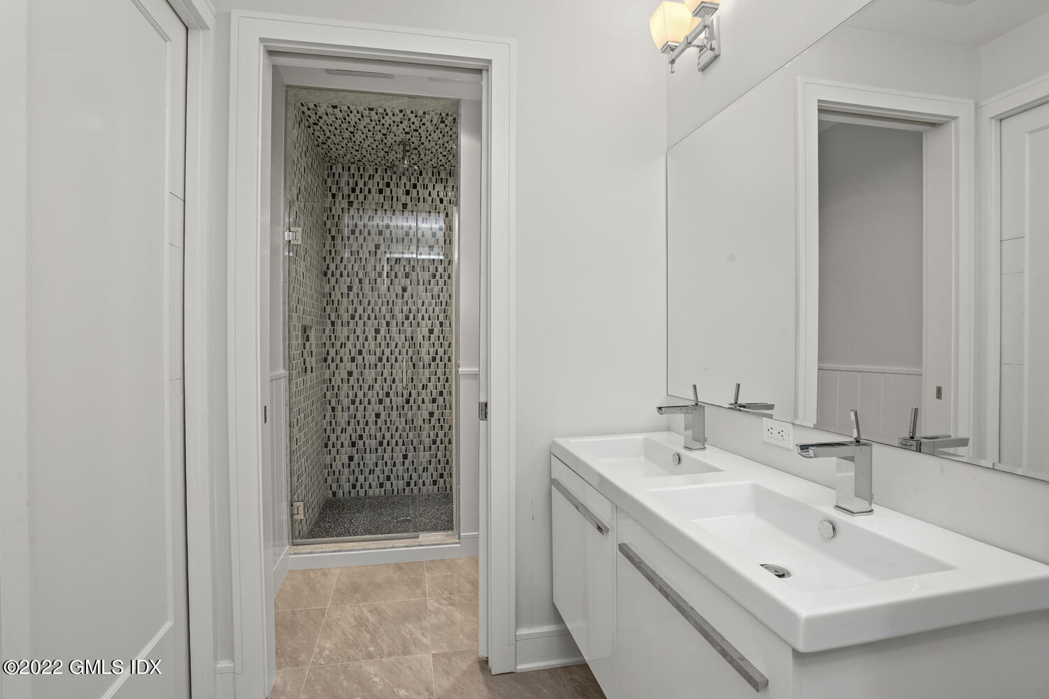 121 Clapboard Ridge Road Greenwich, CT 06830 - Photo 13 of 23 a bathroom with a sink a shower and a mirror