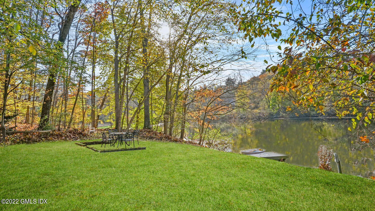 121 Clapboard Ridge Road Greenwich, CT 06830 - Photo 18 of 23 a view of a lake with a park