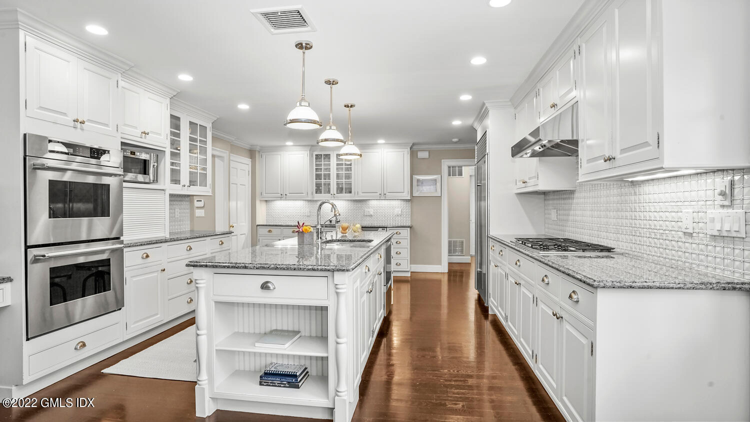 121 Clapboard Ridge Road Greenwich, CT 06830 - Photo 8 of 23 a kitchen with stainless steel appliances granite countertop a stove and a refrigerator