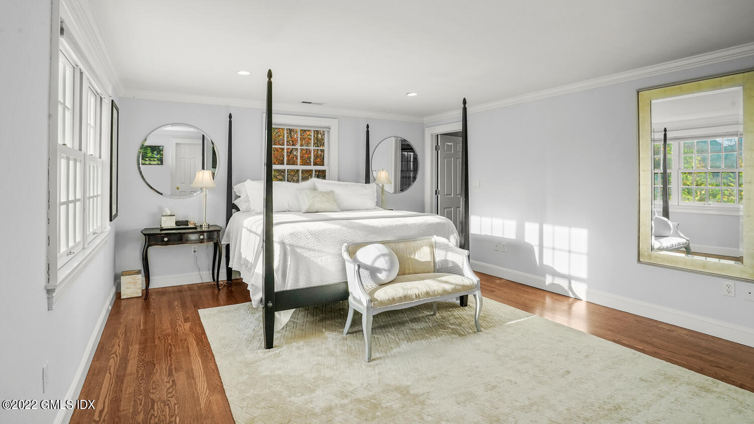 121 Clapboard Ridge Road Greenwich, CT 06830 - Photo 10 of 23 a bedroom with furniture and a wooden floor