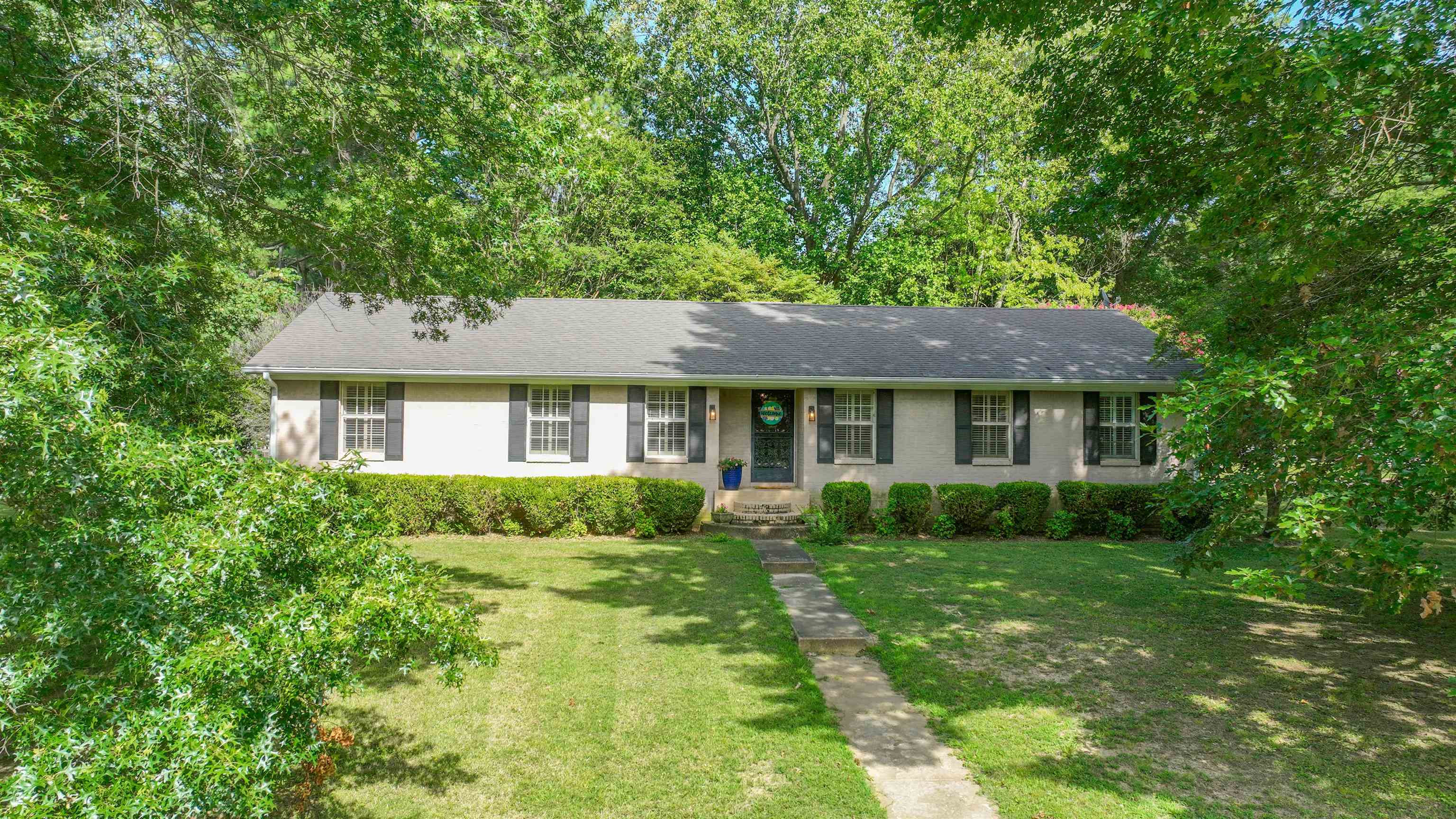 129 Thompson Drive Ripley, TN 38063 - Photo 1 of 22 a view of a house with a yard