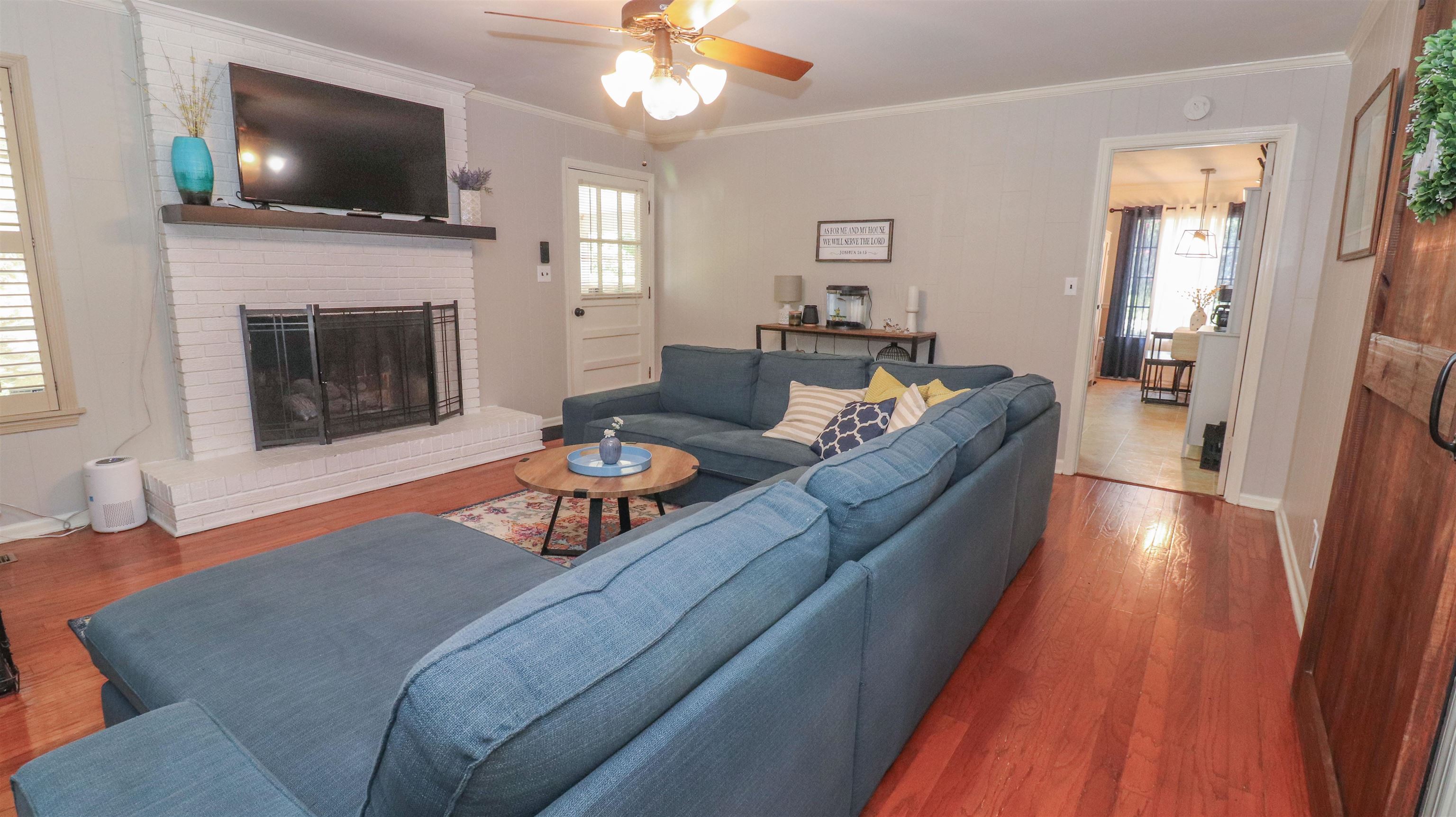129 Thompson Drive Ripley, TN 38063 - Photo 9 of 22 a living room with furniture and a flat screen tv