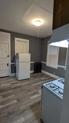 a view of kitchen and utility room