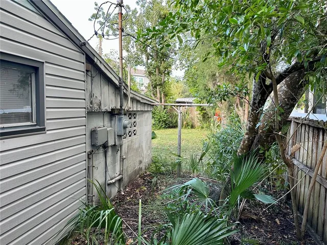 a backyard of a house with lots of green space