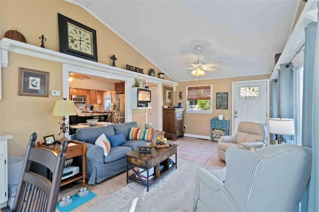 5888 Old Stone Mountain Road Stone Mountain, GA 30087 - Photo 44 of 61 a living room with furniture and a wooden floor
