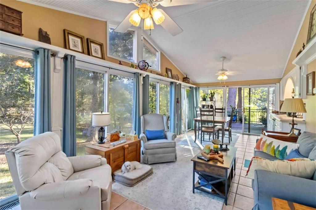 5888 Old Stone Mountain Road Stone Mountain, GA 30087 - Photo 45 of 61 a living room with furniture and a large window