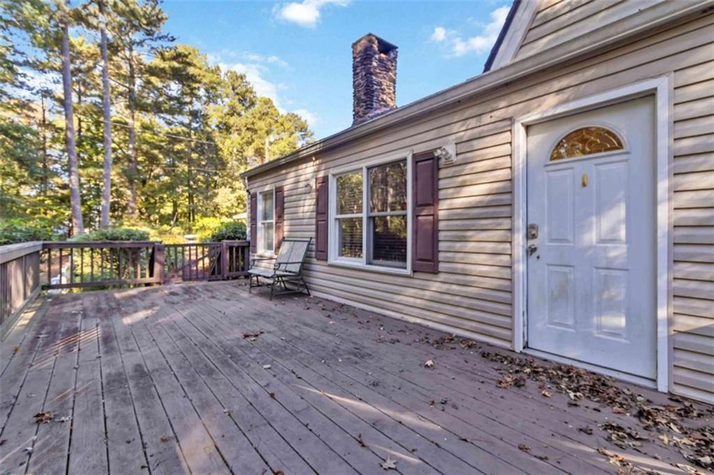 5888 Old Stone Mountain Road Stone Mountain, GA 30087 - Photo 56 of 61 a view of a house with wooden floor