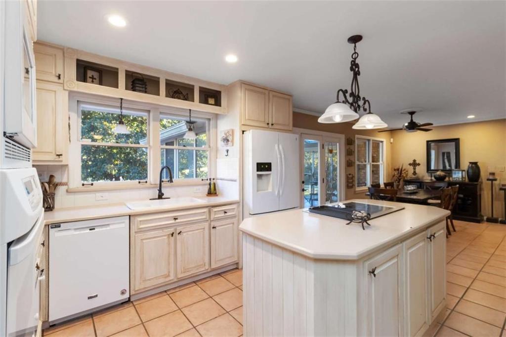 5888 Old Stone Mountain Road Stone Mountain, GA 30087 - Photo 10 of 61 a kitchen with counter top space and sink