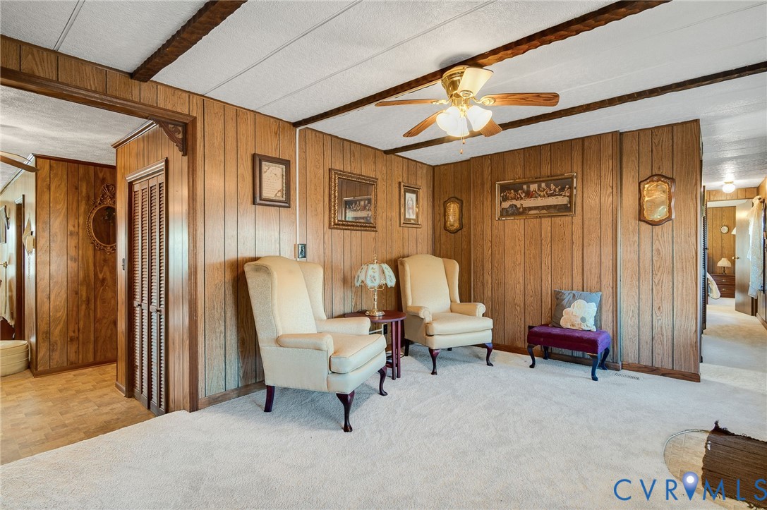 475 Dove Road Boydton, VA 23917 - Photo 7 of 45 a living room with furniture and a lamp