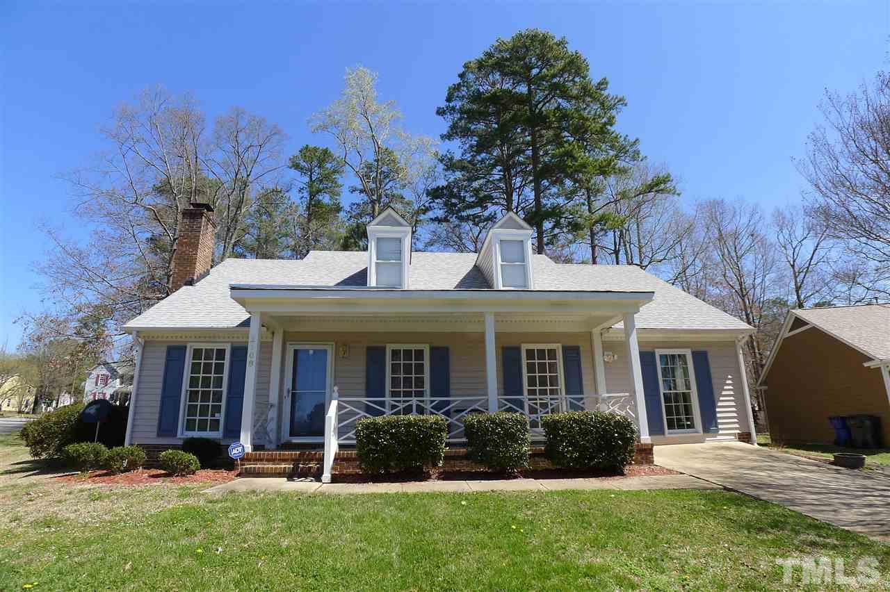 2708 Heathersmith Court Raleigh, NC 27604 - Photo 1 of 25 a front view of a house with a yard and trees