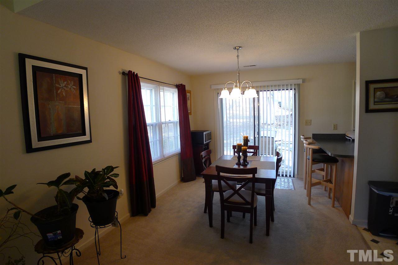 2708 Heathersmith Court Raleigh, NC 27604 - Photo 3 of 25 a view of a dining room with furniture and window