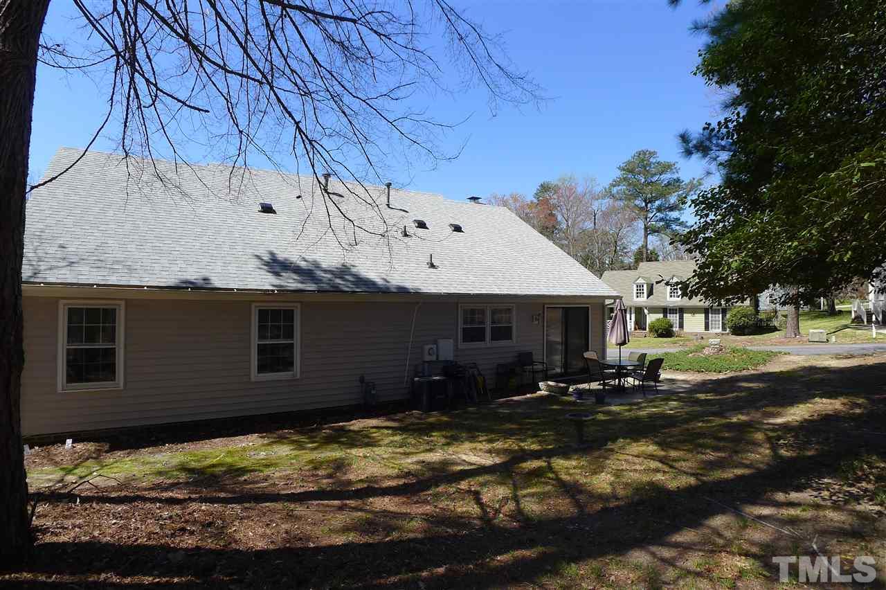 2708 Heathersmith Court Raleigh, NC 27604 - Photo 22 of 25 a front view of a house with a yard