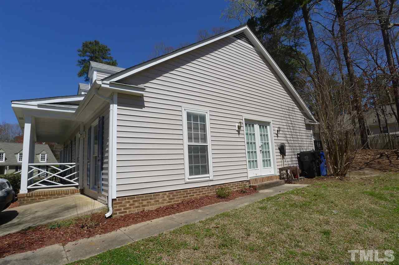 2708 Heathersmith Court Raleigh, NC 27604 - Photo 24 of 25 a view of a house with backyard