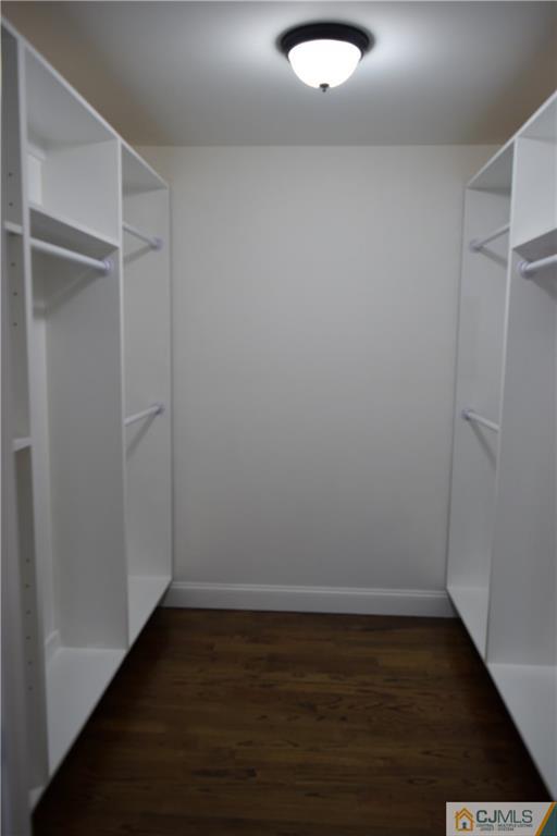 223 New Dover Road Colonia, NJ 07067 - Photo 14 of 25 a view of an empty room with wooden floor