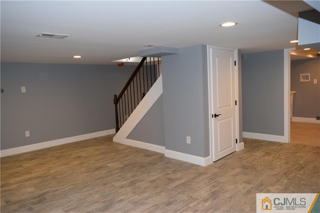 223 New Dover Road Colonia, NJ 07067 - Photo 22 of 25 a view of an entryway with wooden floor