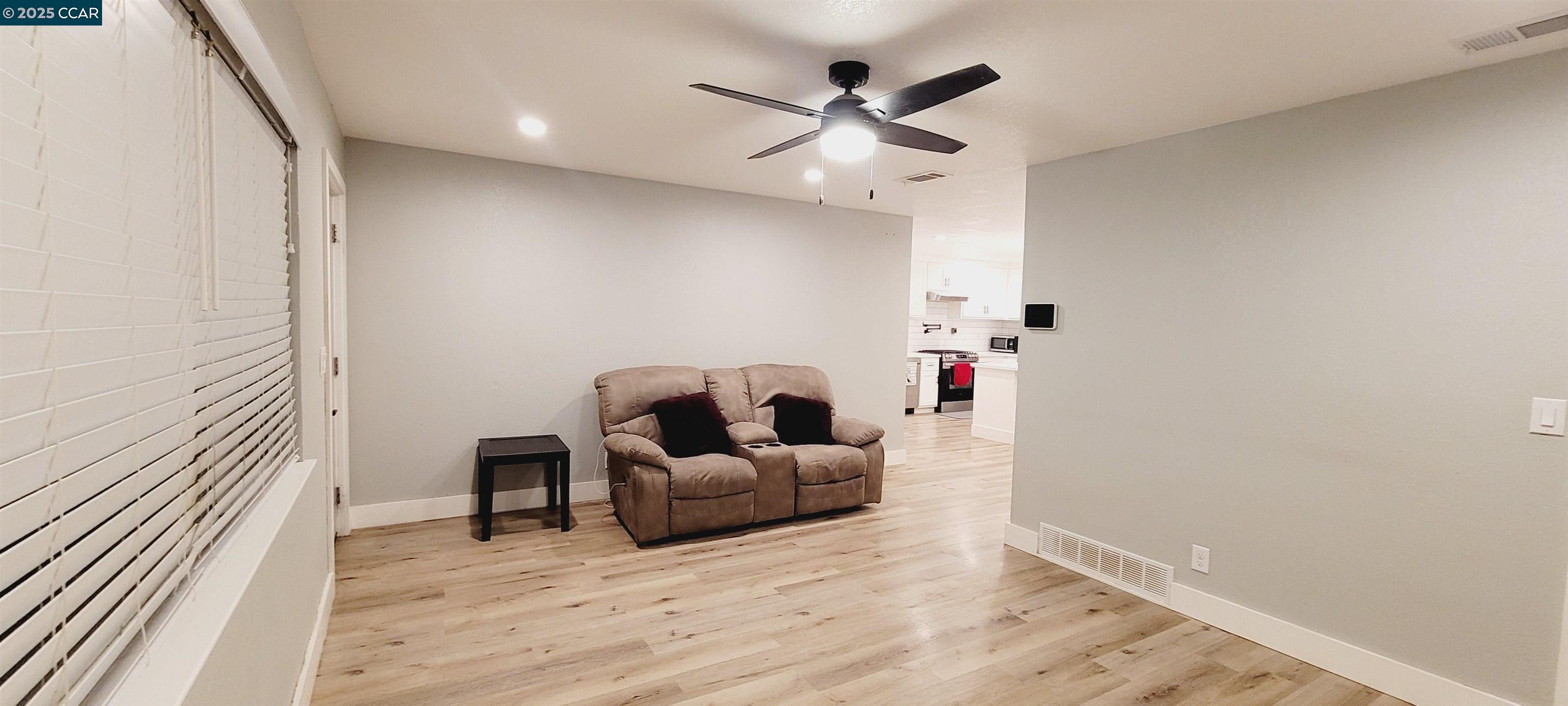 2744 El Rey Street Antioch, CA 94509 - Photo 18 of 23 a living room with furniture and a ceiling fan