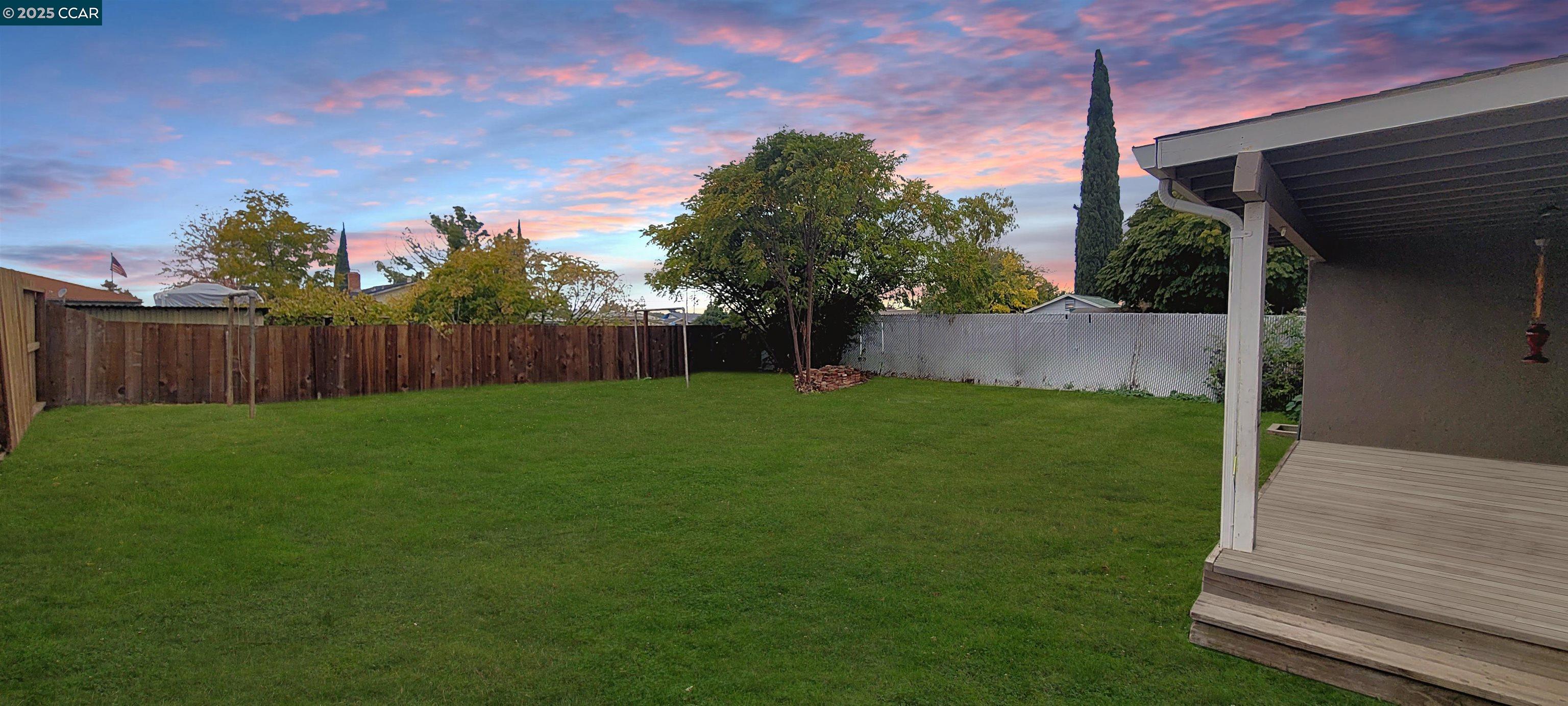 2744 El Rey Street Antioch, CA 94509 - Photo 23 of 23 a view of a backyard with large tree