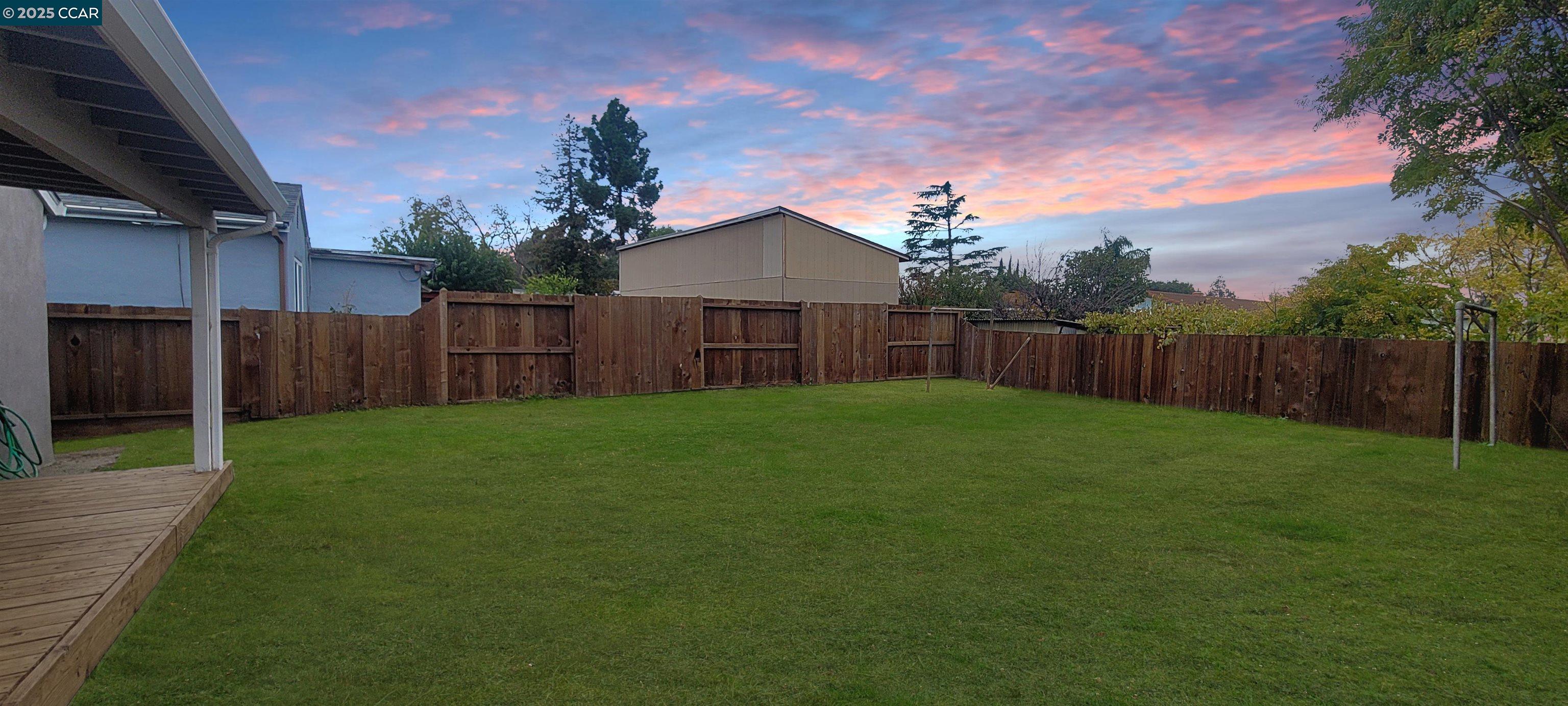 2744 El Rey Street Antioch, CA 94509 - Photo 3 of 23 a backyard of a house with lots of green space