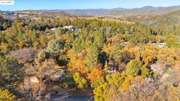 a view of a city with mountains in the background