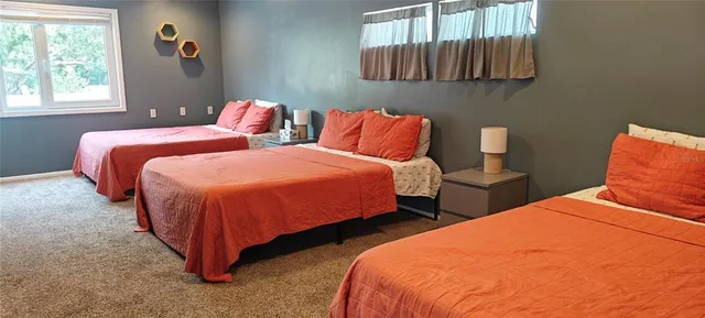 a bedroom with a bed and a walk in closet