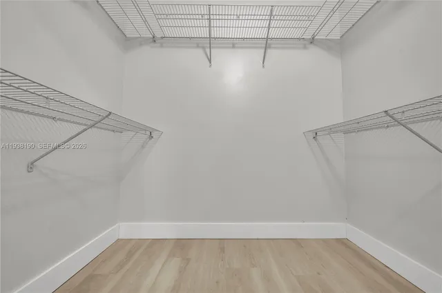 a view of a room with racks on the wall