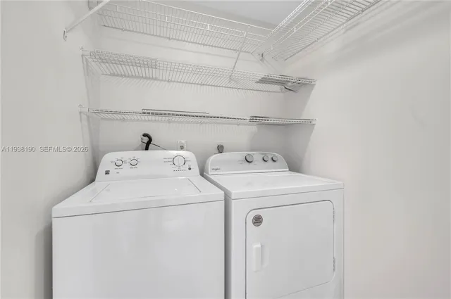 a view of swimming pool with chairs