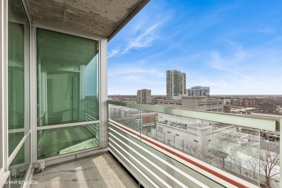 800 Elgin Road, Unit 1502 Evanston, IL 60201 - Photo 15 of 19 a view of a balcony with an outdoor space