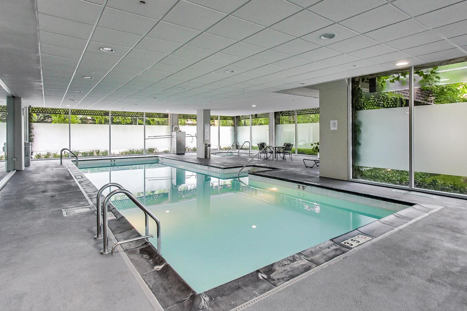 800 Elgin Road, Unit 1502 Evanston, IL 60201 - Photo 18 of 19 a view of a swimming pool and outdoor seating