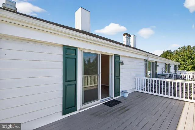a view of a house with a deck