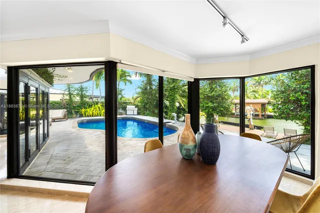 a view of a floor to ceiling window and an outdoor view
